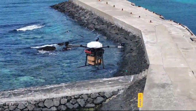A drone carrying cargo departs from Geumneung, Jeju, heading for Biyangdo Island. Courtesy of KASA